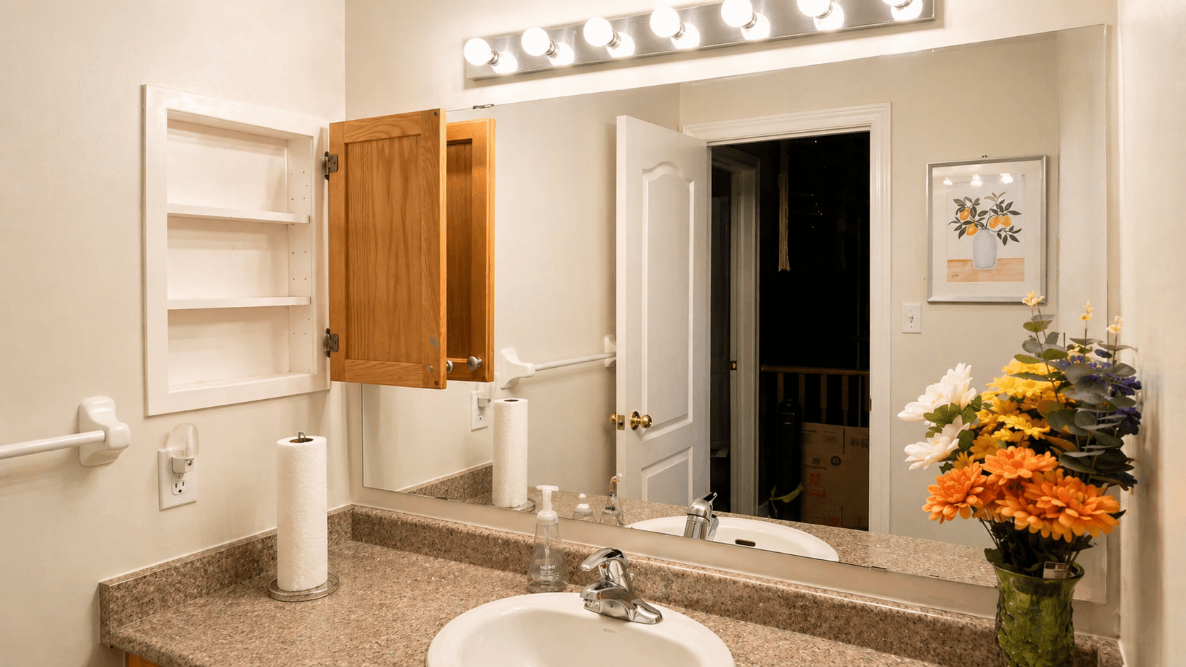Cozy Bathroom with Vanity and Flowers at 2 Bedroom Main Floor Unit in Northeast Ajax – 45 Thackery Drive, a 2 bedroom rental in 45 Thackery Drive, Ajax, ON, listed for $750 per month