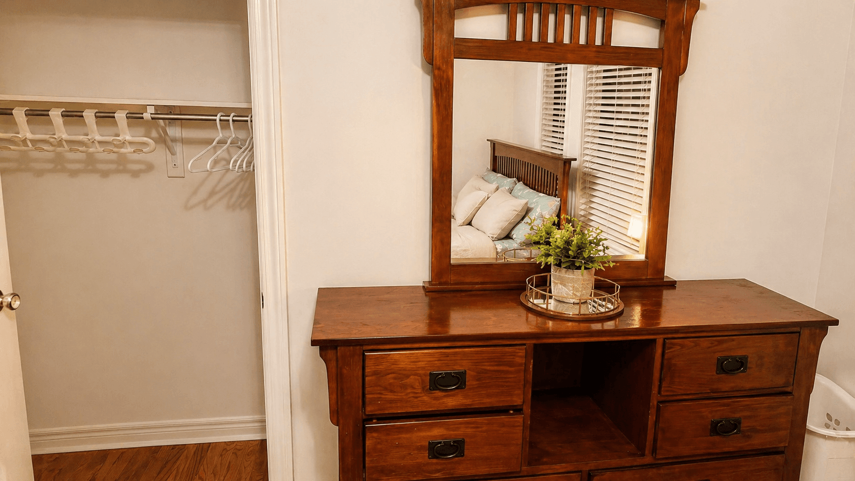 Cozy Bedroom with Dresser and Mirror at 2 Bedroom Main Floor Unit in Northeast Ajax – 45 Thackery Drive, a 2 bedroom rental in 45 Thackery Drive, Ajax, ON, listed for $750 per month