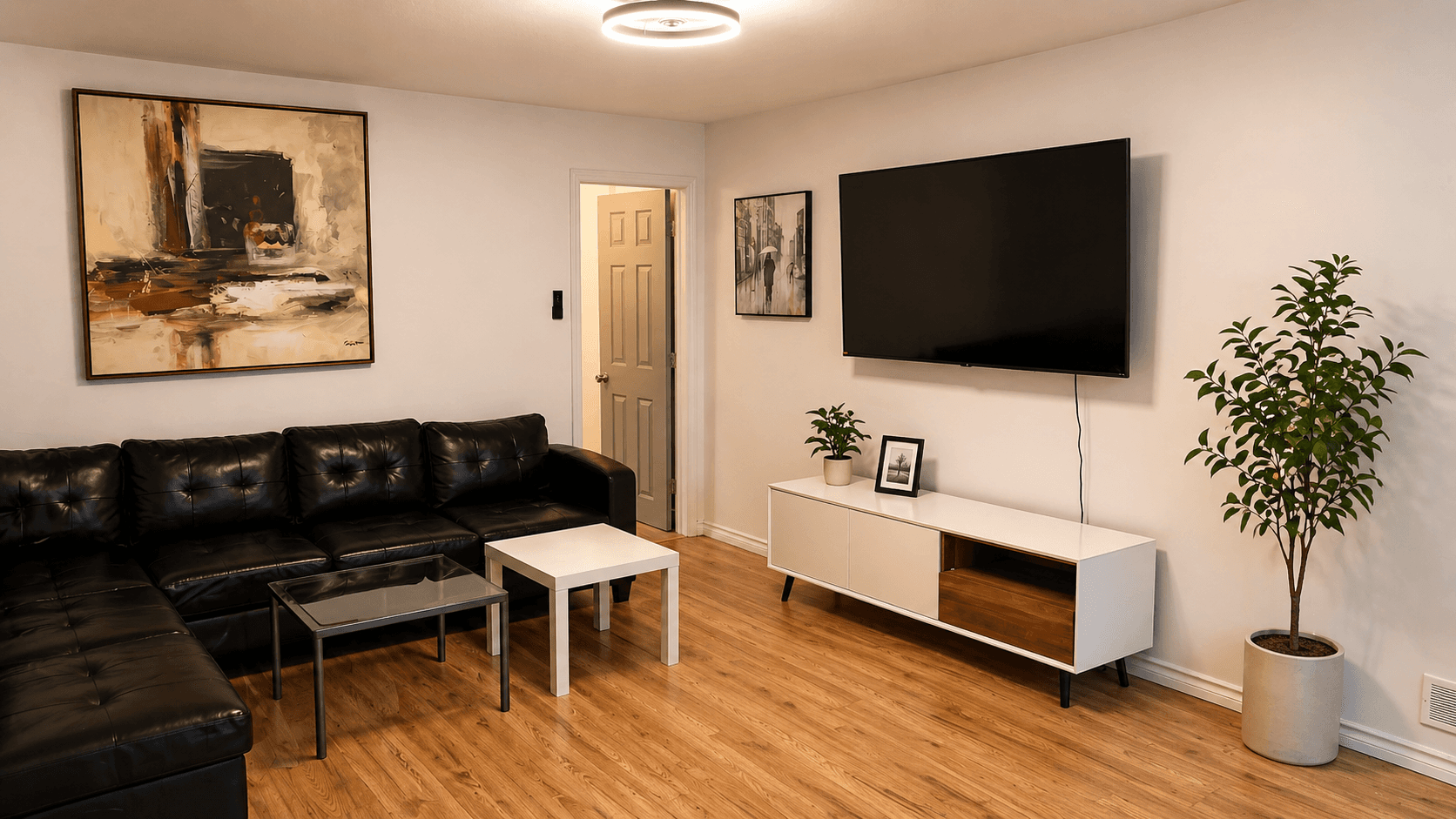 Cozy Living Room with Modern Decor at Modern 1-Bedroom Condo in Hintonburg, Ottawa – Prime Location, a 1 bedroom rental in 4 Armstrong Street, Ottawa, ON, listed for $1,795 per month