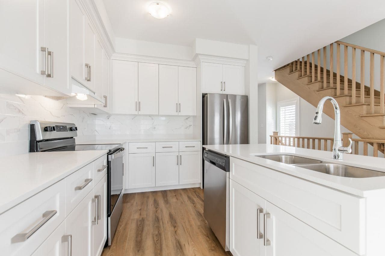 Modern Kitchen with Stainless Steel Appliances at 1 Bedroom Townhouse for $1,200, a 1 bedroom rental in 23 BayBerry Lane, Hamilton, ON, listed for $1,200 per month